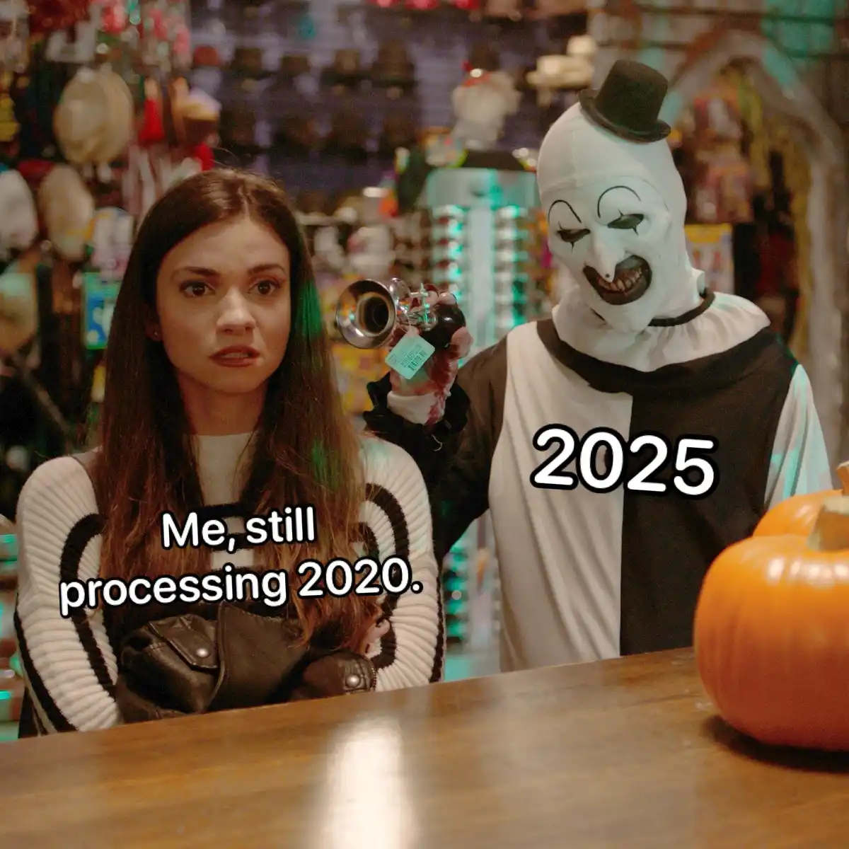A woman with a shocked expression sits at a counter, overlaid with the text 'Me, still processing 2020.' Beside her stands a…