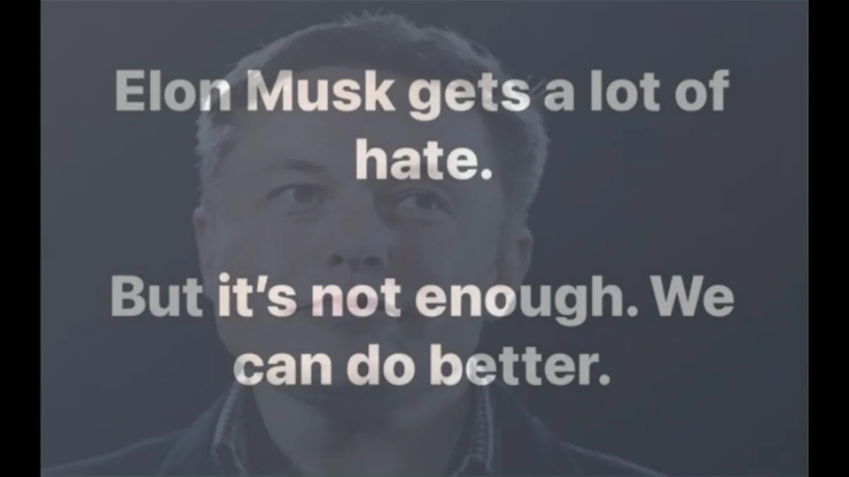 A desaturated image of Elon Musk's face with white text overlaid. The text reads: 'Elon Musk gets a lot of hate. But it's…