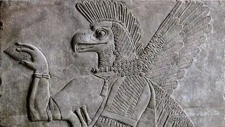 A stone relief depicts a mythological griffin with an eagle's head, lion's body, and large feathered wings, holding an…