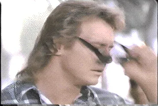 A six-panel meme sequence shows a man putting on sunglasses, then a billboard advertising 'come to the... CARIBBEAN' with a…