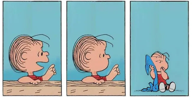 A three-panel comic strip shows a young boy in a red shirt sitting on a wooden floor. In the first two panels, he looks off…