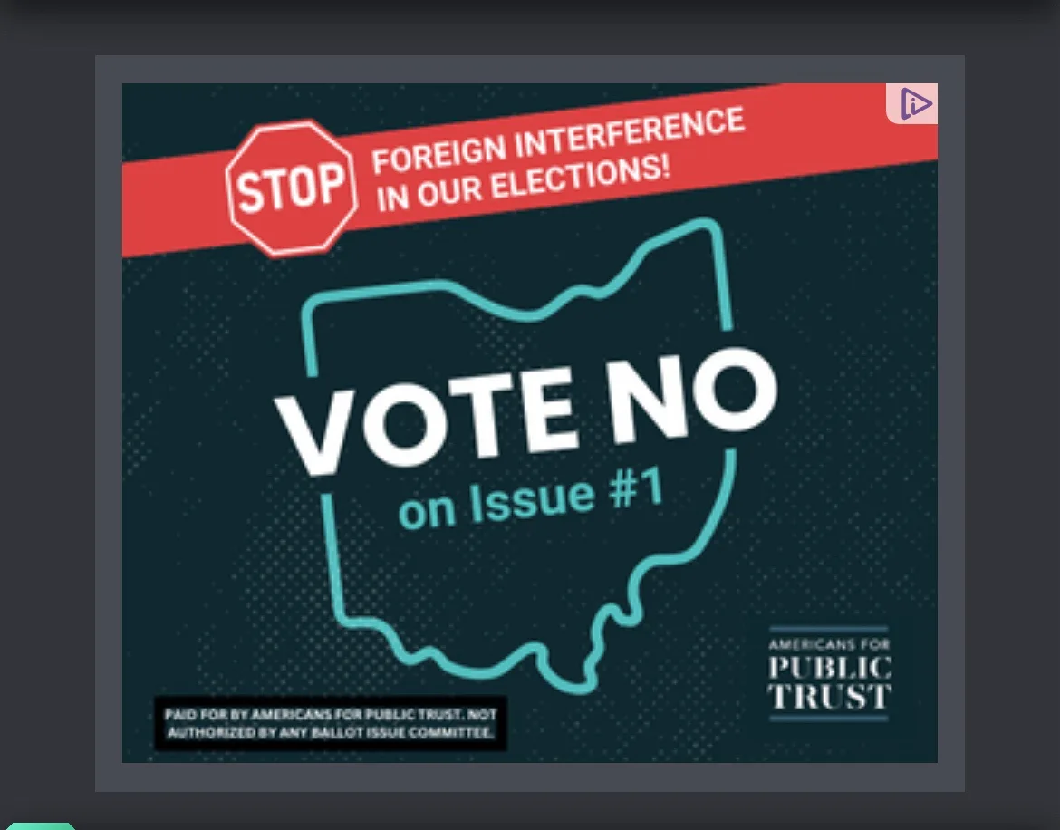 A political advertisement featuring a teal outline of the state of Ohio on a dark background. A red banner at the top with a…