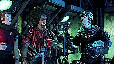 A six-panel comic strip from the animated series 'Star Trek: The Next Generation' shows a scene escalating from a calm…