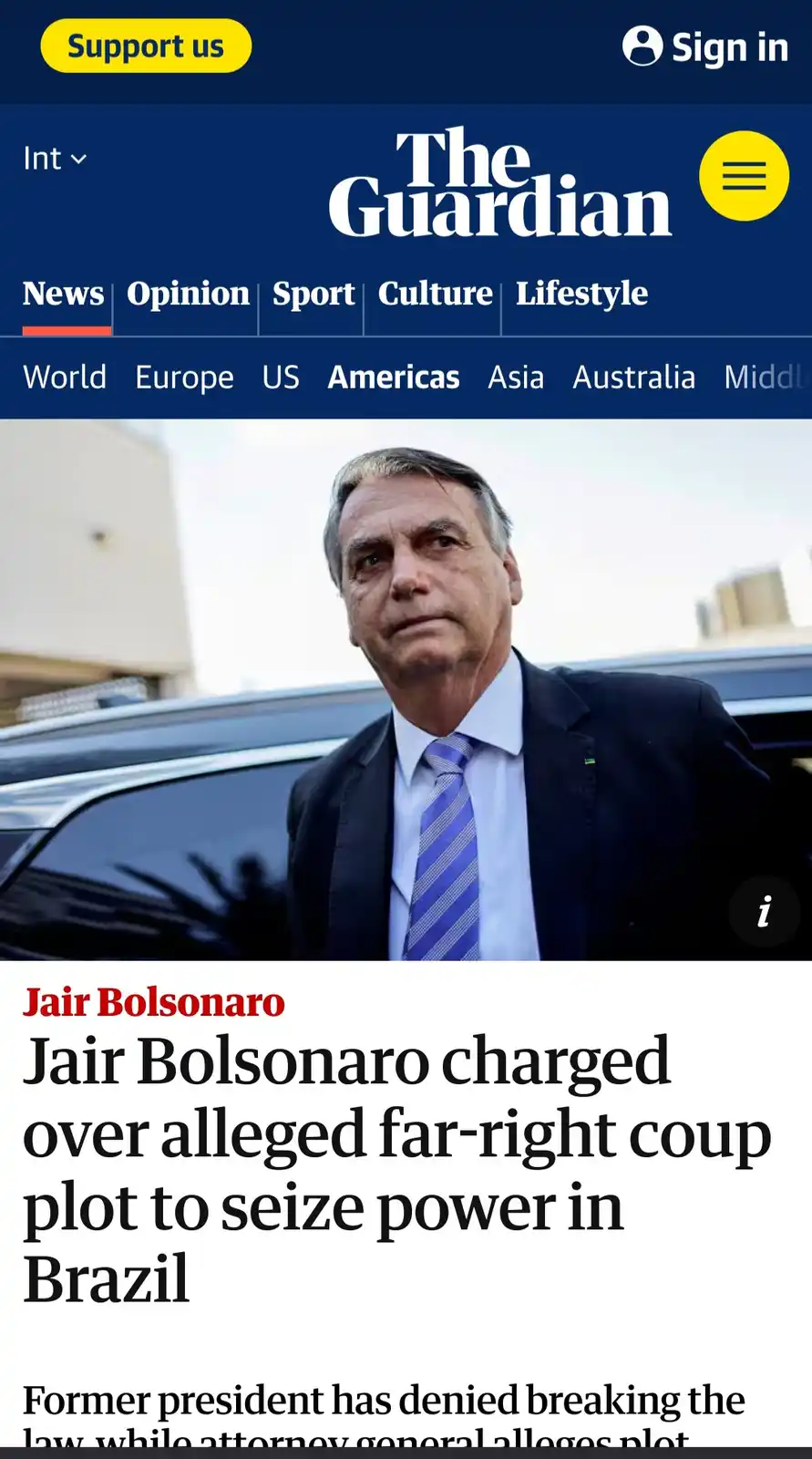 The image shows a screenshot of The Guardian's news website featuring a headline about Jair Bolsonaro being charged over an…