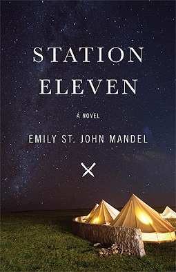 The image displays the cover of the novel 'Station Eleven' by Emily St. John Mandel, featuring a starry night sky above…