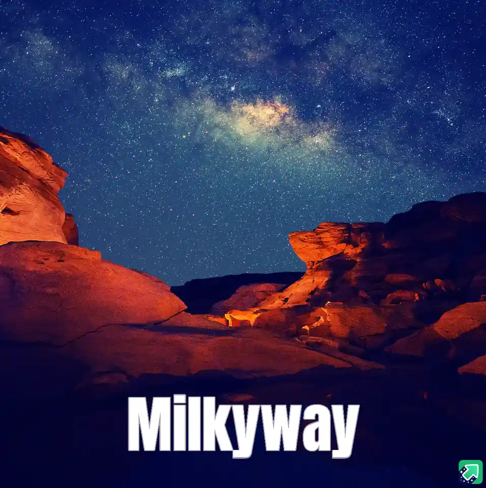 A stunning night sky photograph showing the Milky Way galaxy arching across a star-filled blue expanse, framed by large…