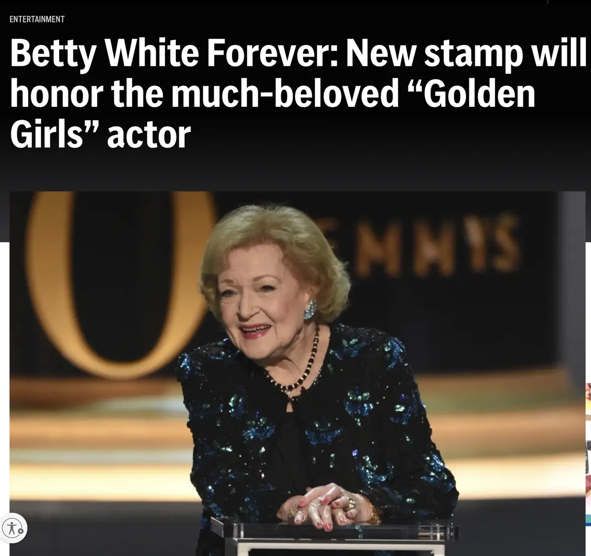 A screenshot of a news article header showing Betty White smiling at an event, with the text 'Betty White Forever: New stamp…