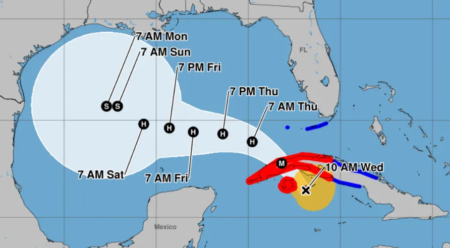 A weather map shows a hurricane's projected path, with a large light blue cone of uncertainty stretching from the Caribbean…