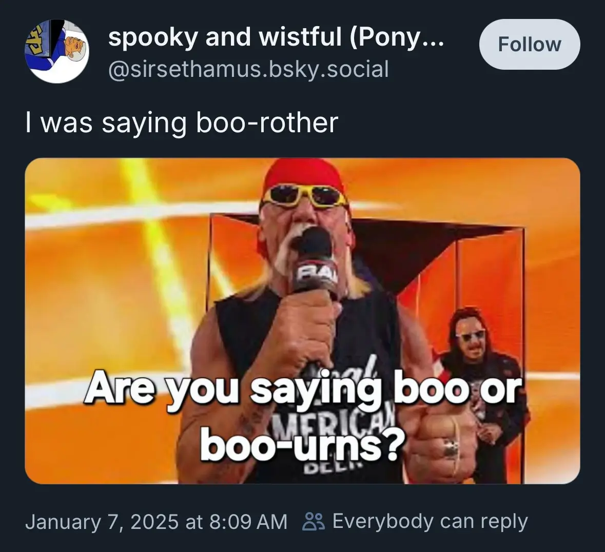 A screenshot of a social media post showing a photo of professional wrestler Hulk Hogan speaking into a microphone. He is…