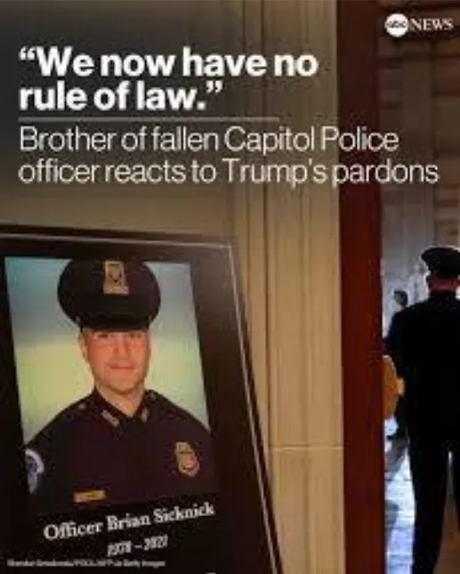 A framed portrait of Officer Brian Sicknick, who died in 2021 during the Capitol riot, is displayed indoors. The photo shows…
