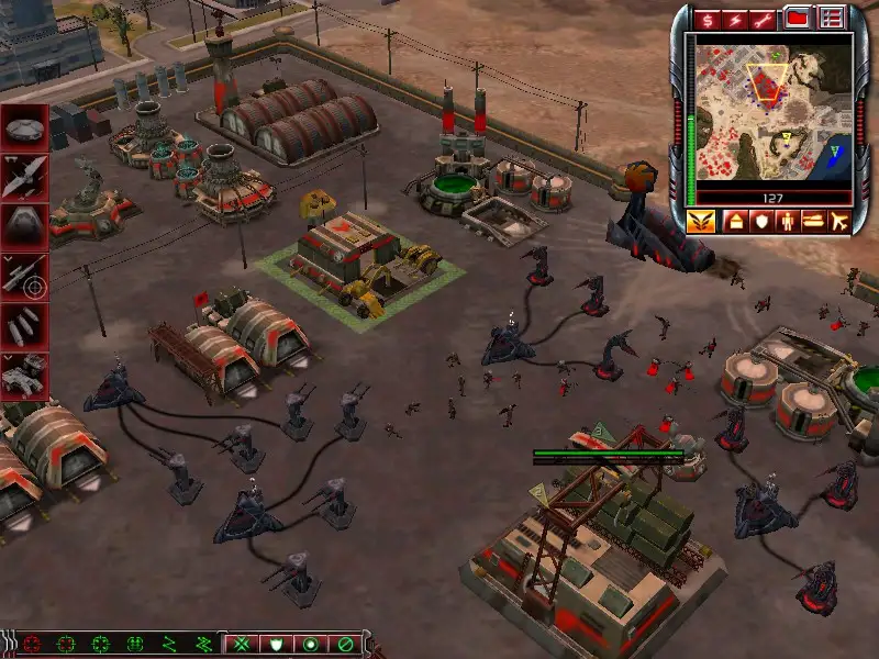 A screenshot from the real-time strategy game 'Command & Conquer: Red Alert 3' shows a player's base with numerous military…