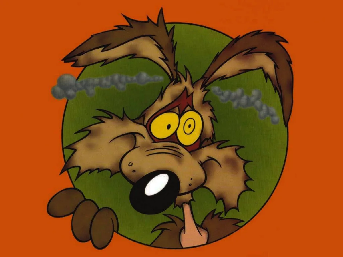 A cartoon dog with wide, yellow eyes and steam coming out of its ears is peeking from behind a green bush, holding a finger…